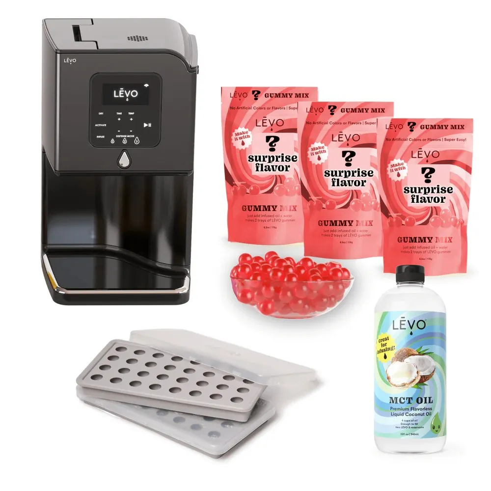 LEVO Lux infuser machine with MCT oil, silicone molds, and gummy mix packets — Maria’s must-have setup for infusing cannabis oils and crafting perfect weed gummies.