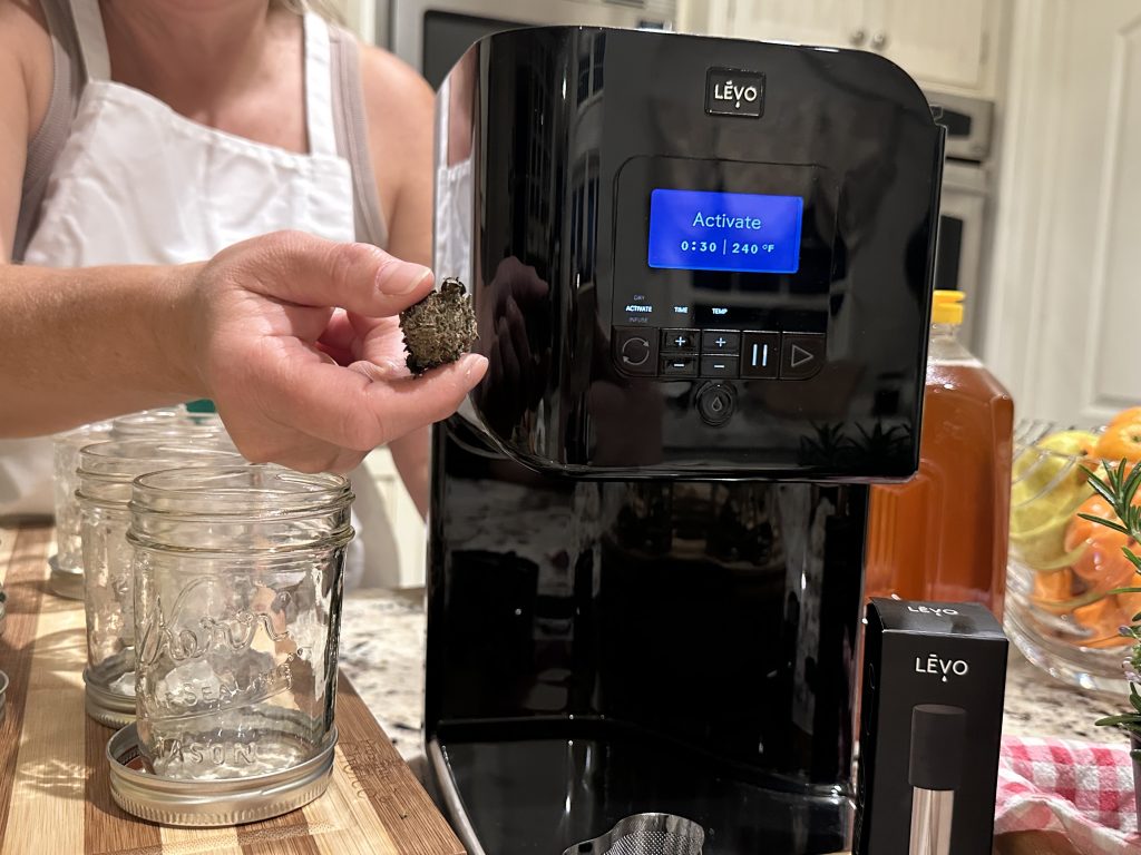 Cannabis flower in the LĒVO pod during the activate cycle, ready for decarboxylation before infusion.