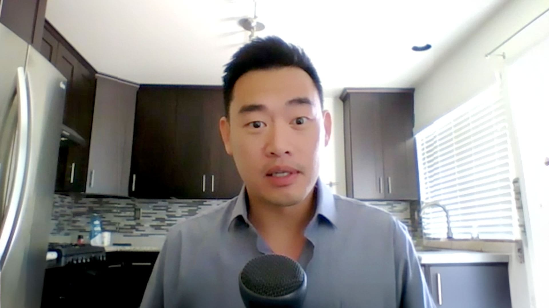 Dr. Tim Shu being interviewed looking at the camera.